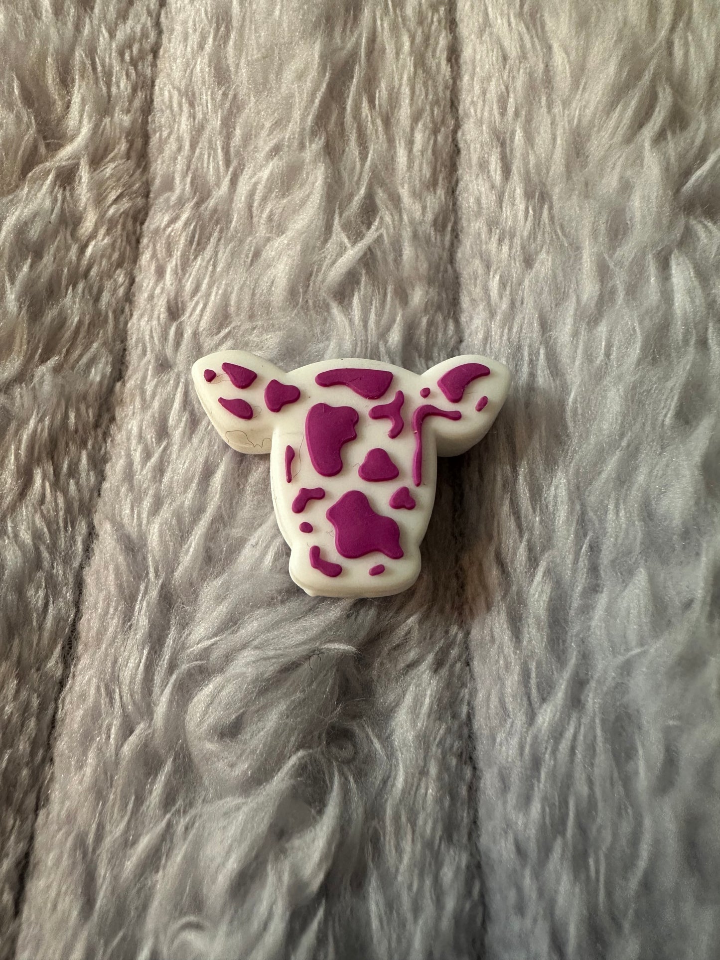 Purple & white cow