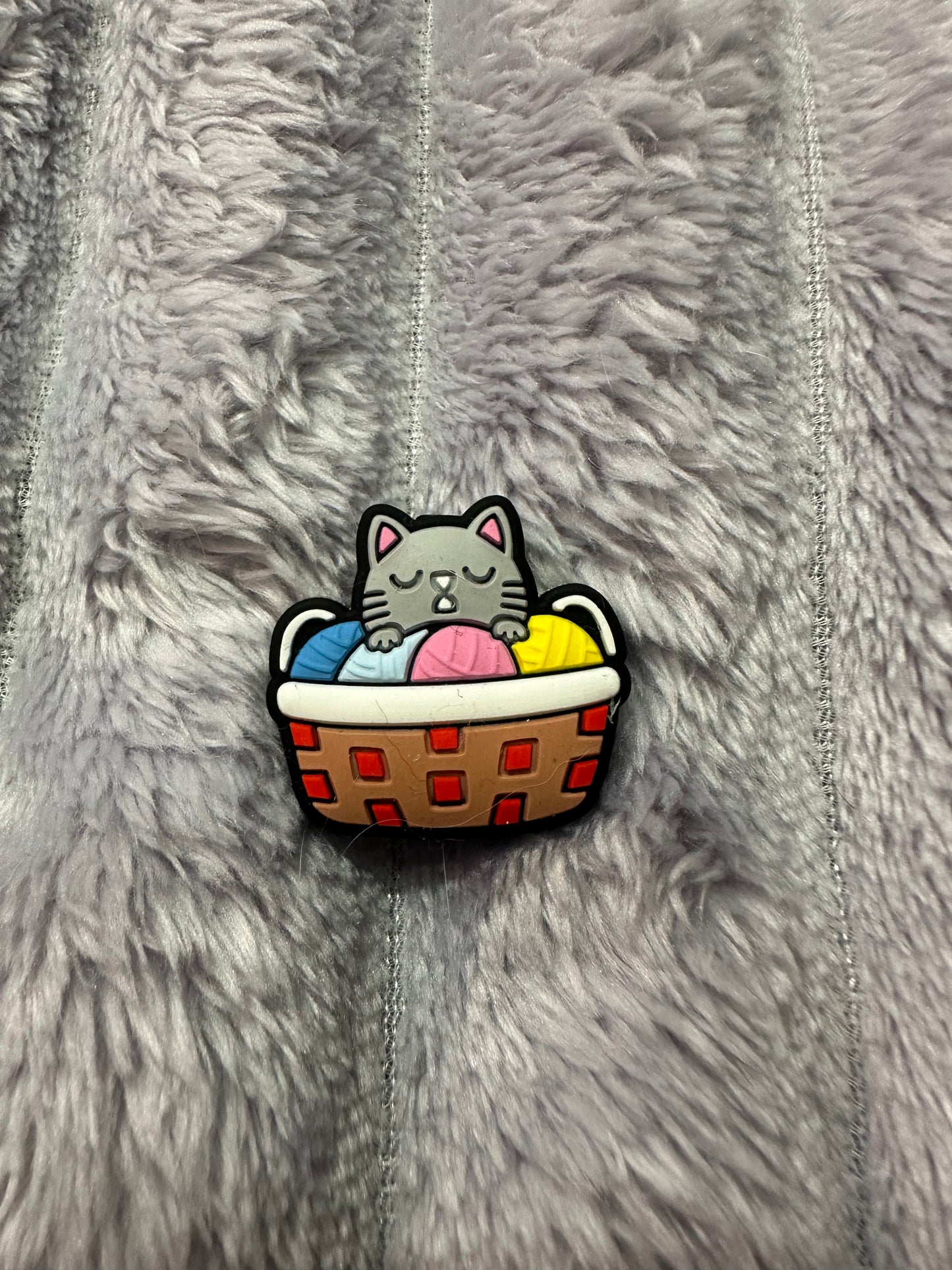 Kitty in a basket of yarn