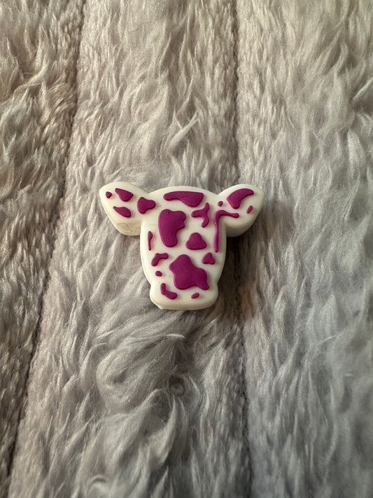 Purple & white cow
